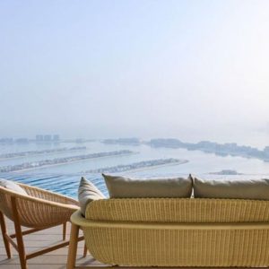 Rise with AURA, Sunrise Pool Experience - Palm View sofa seating